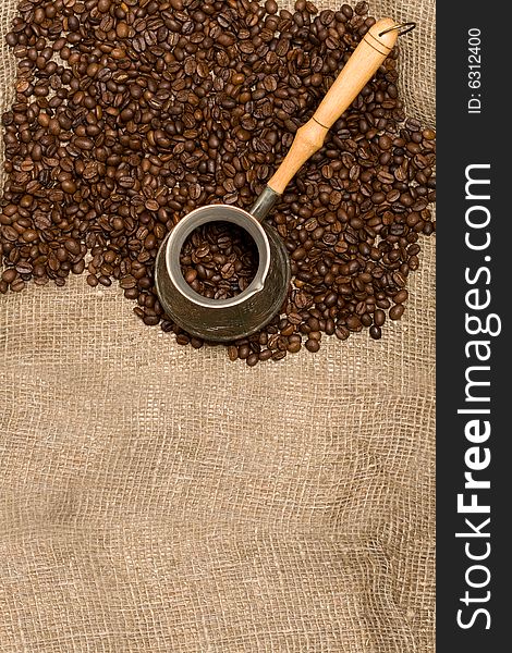 Cezve with freshly roasted coffee beans