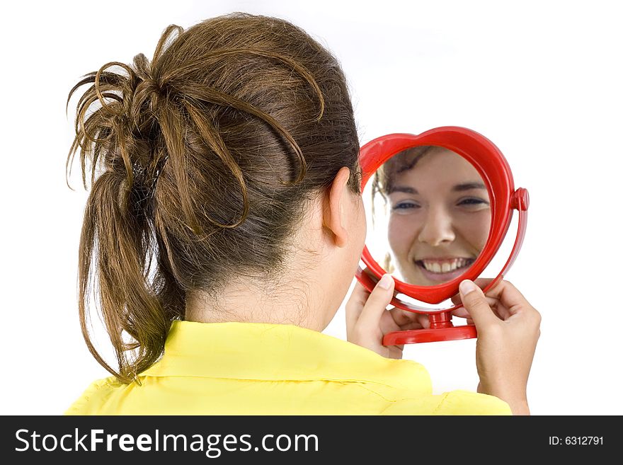 Girl and mirror isolated on white background