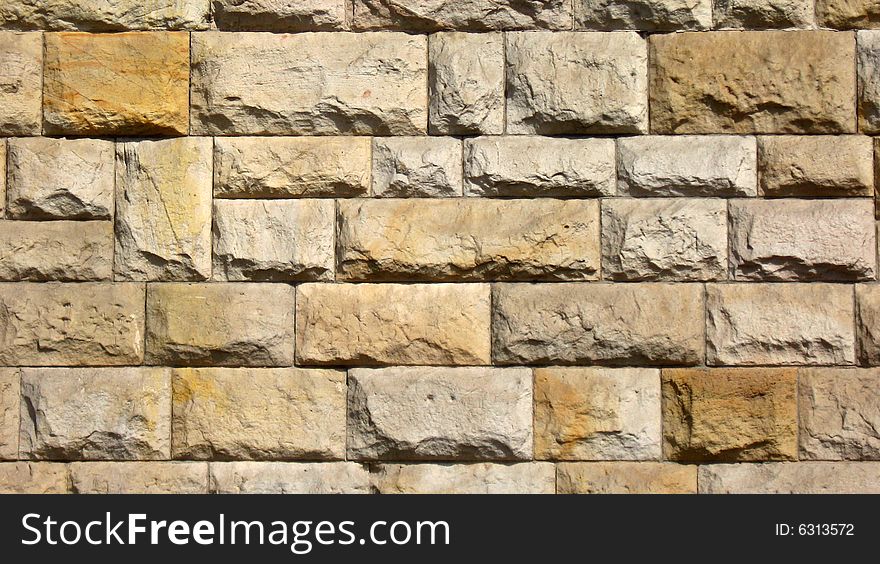 Beautifully shaded stones of a recently renovated old castle wall, natural colors. Beautifully shaded stones of a recently renovated old castle wall, natural colors.