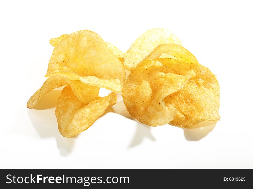 Crunchy potato chips composition isolated. Crunchy potato chips composition isolated