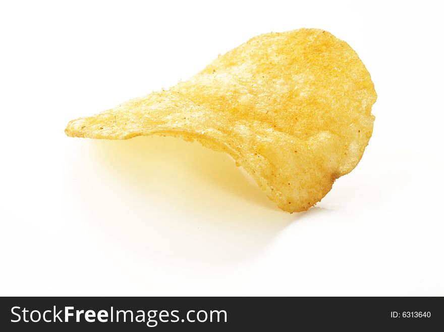 Crunchy potato chip against white background. Crunchy potato chip against white background