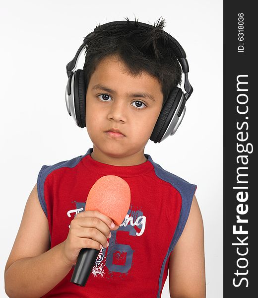 Asian boy with headphones mike