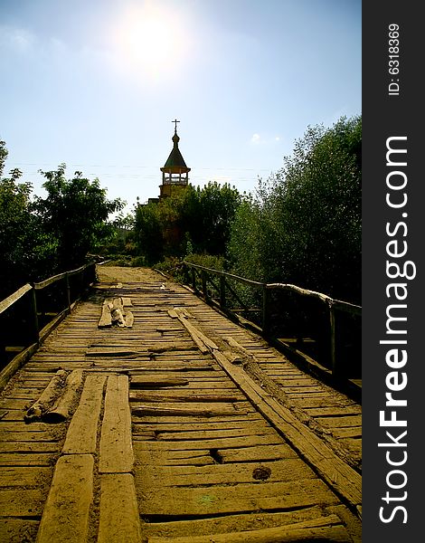 Old wooden foot bridge, blue sky. Old wooden foot bridge, blue sky