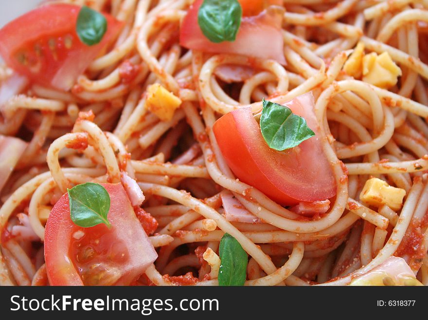 Italian pasta with fresh tomatoes, cheese and spices