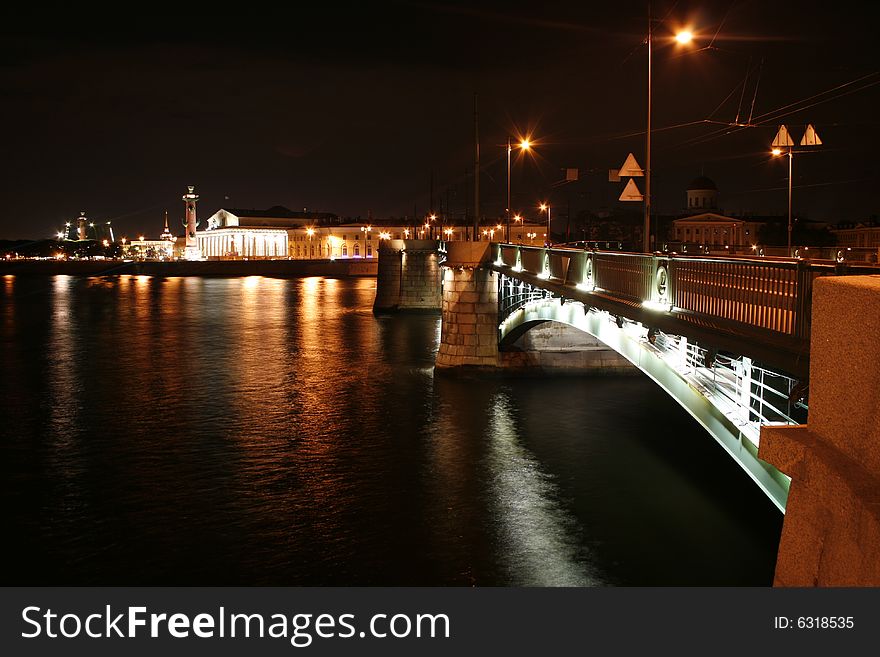 Night brige in st. Petersburg and the Exchange building and the Rostral columns