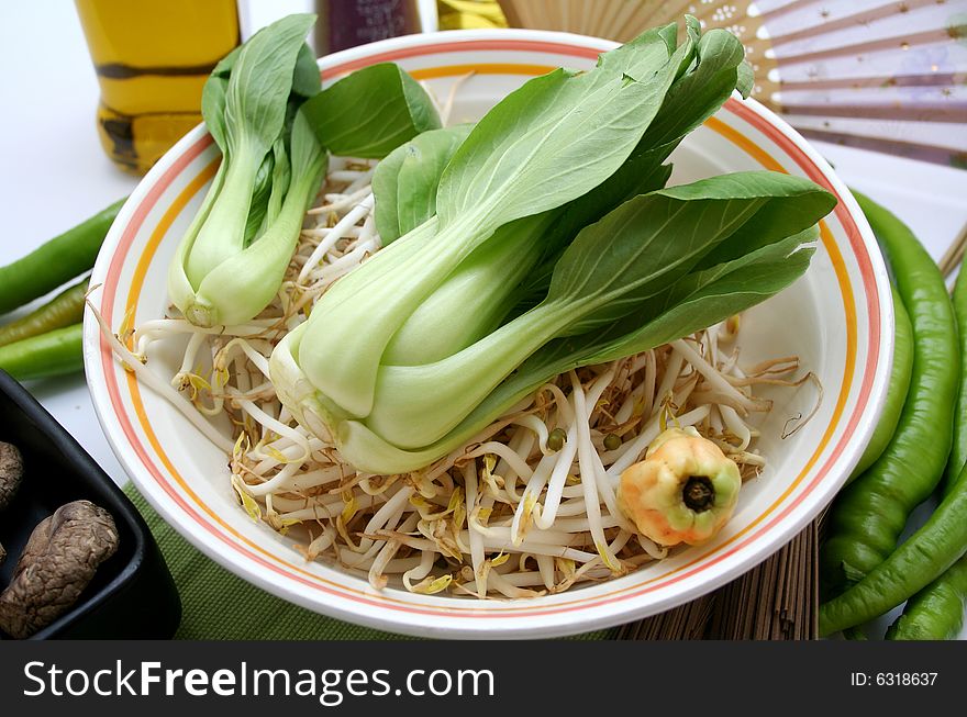 Some fresh asian vegetables in a bowl. Some fresh asian vegetables in a bowl