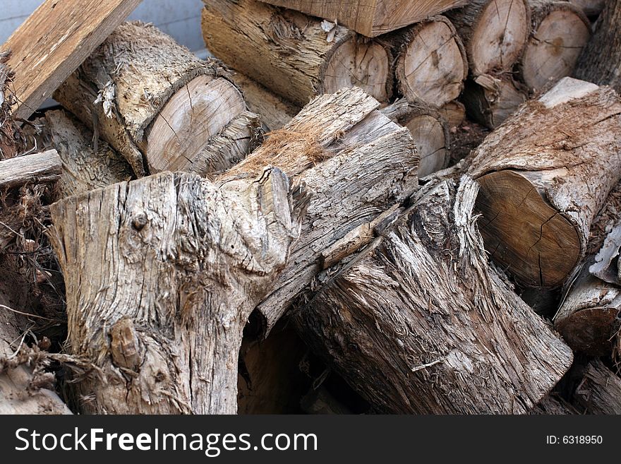 Details of a pile of chopped logs.