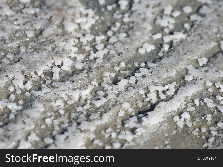 Salt Crystals On A Grey Sand