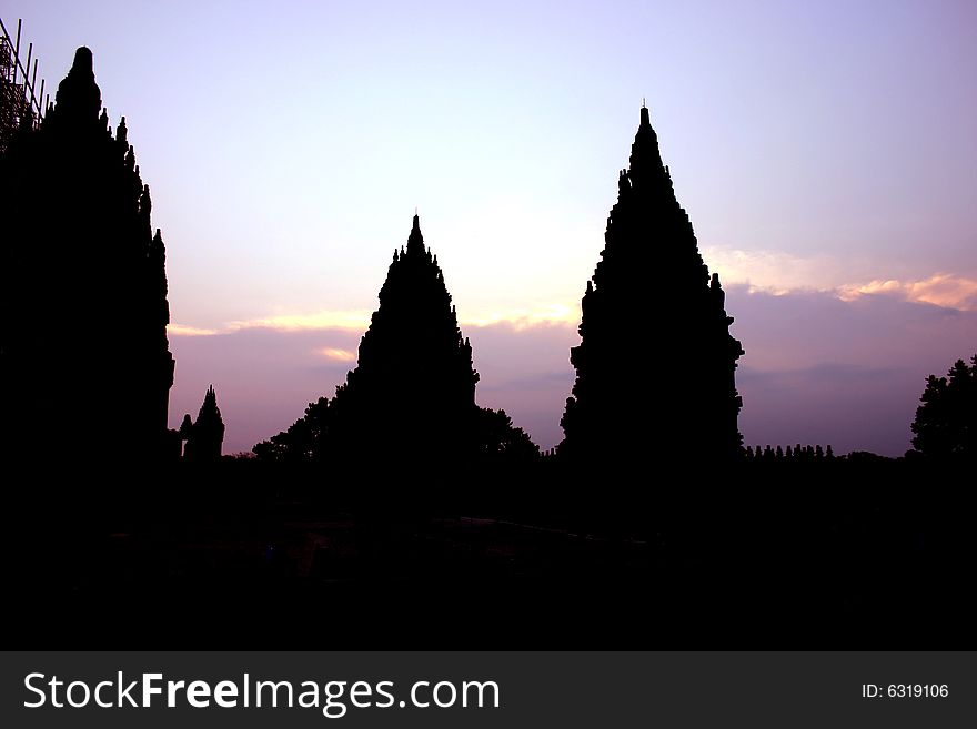 Silhouette of Hindu temles against a purple sky. Silhouette of Hindu temles against a purple sky.