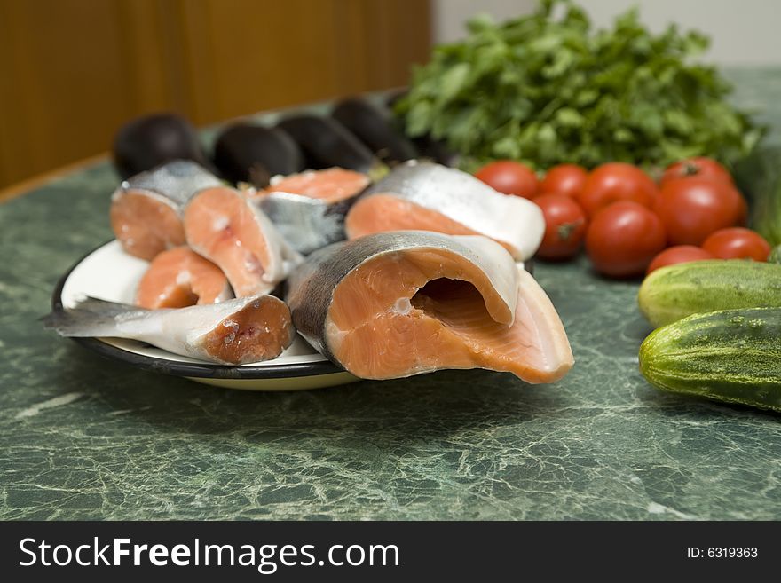 Fresh red salmon fish with vegetable cucumber and tomato