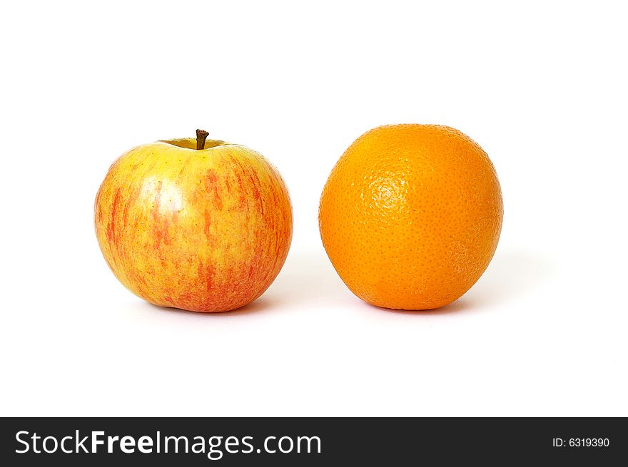Orange and apple isolated on a white background