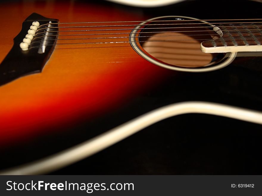 An abstract close up of an acoustic guitar. An abstract close up of an acoustic guitar