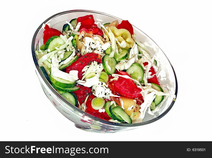 Fresh cut vegetables in grass bowl isolated over white. Fresh cut vegetables in grass bowl isolated over white