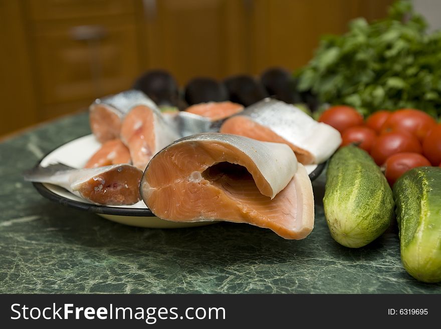 Fresh red salmon fish with vegetable cucumber and tomato