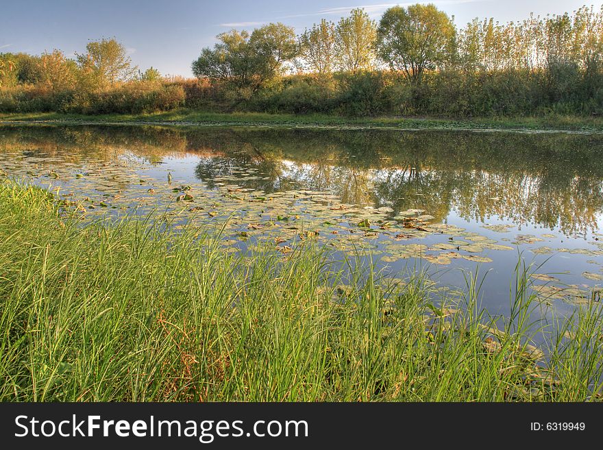 Beautiful river side with reflection. Beautiful river side with reflection