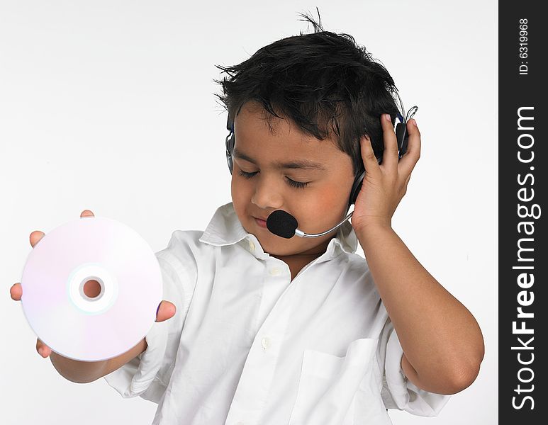 Asian boy holding cd with headphone