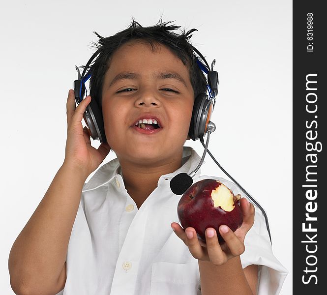 Boy Biting A Red Apple