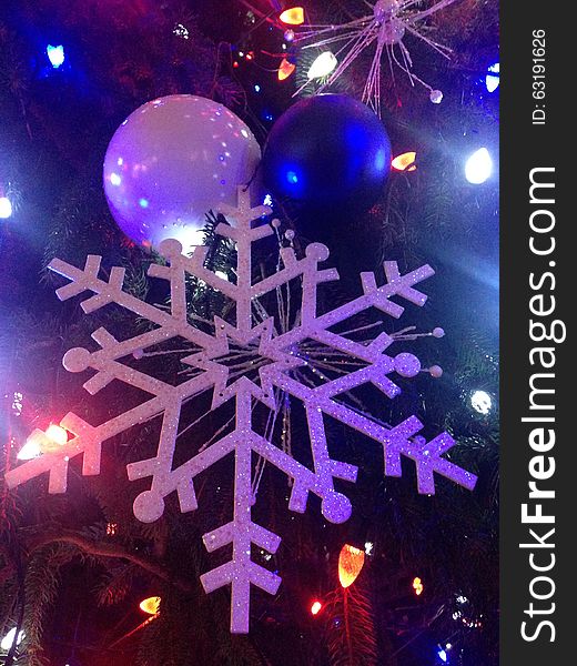 Christmas Tree Decorations and Lights on a Christmas Tree in Bryant Park in Manhattan, New York, NY. Christmas Tree Decorations and Lights on a Christmas Tree in Bryant Park in Manhattan, New York, NY.