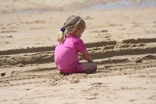 Little Girl On The Beach Royalty Free Stock Photo