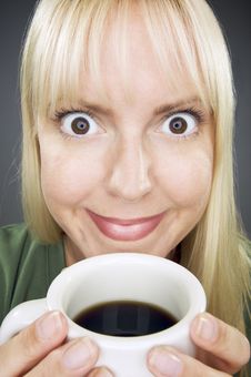 Beautiful Woman Enjoys Coffee Stock Image