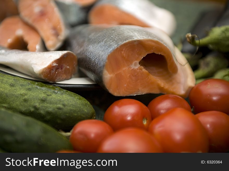 Fresh red salmon fish with vegetable cucumber and tomato