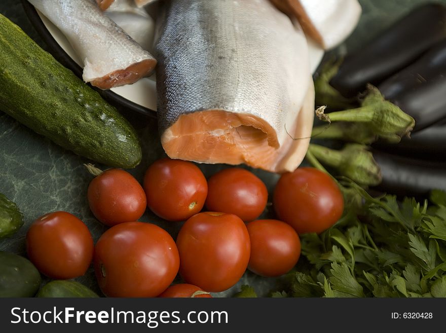 Fresh red salmon fish with vegetable cucumber and tomato