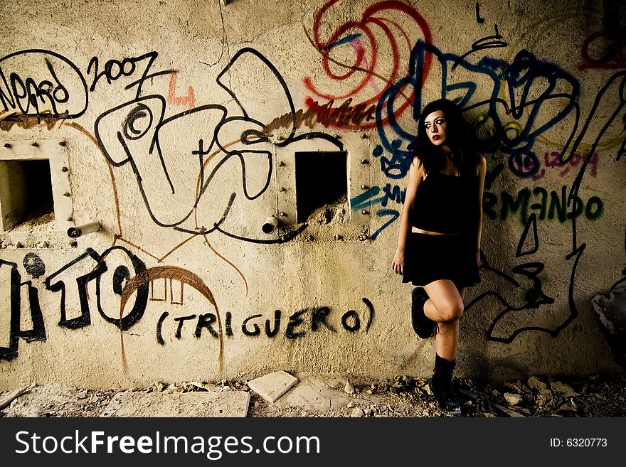 Sad gothic girl in dirty wall. Sad gothic girl in dirty wall