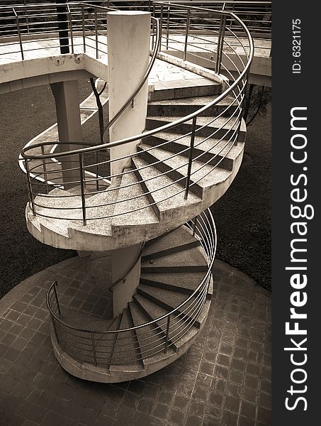 Modern outdoor spiral stair way in tropical area. Modern outdoor spiral stair way in tropical area