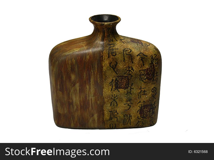 A ornamental brown vase with Chinese characters. A ornamental brown vase with Chinese characters.