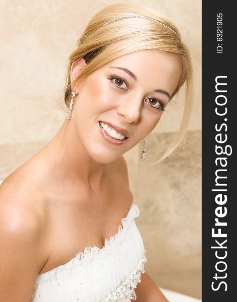 Beautiful Blond bride wearing diamond jewelery on her wedding day. Beautiful Blond bride wearing diamond jewelery on her wedding day