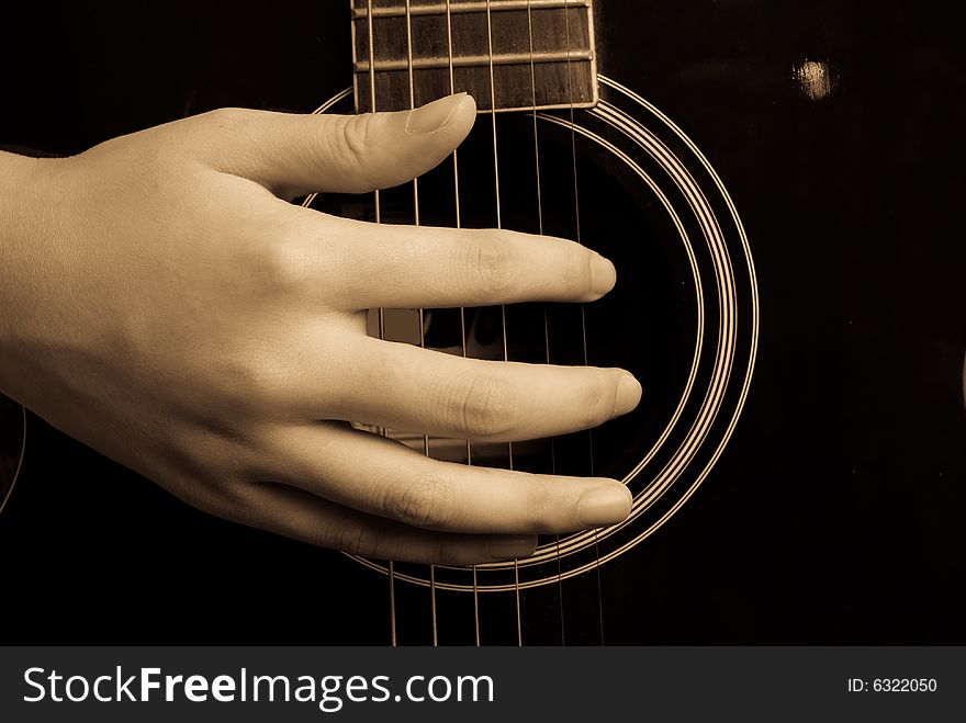 Hand and Guitar