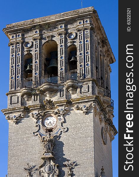 Arcos de la Frontera - Scenic Shot of the clock tower at the top of the hill. Arcos de la Frontera - Scenic Shot of the clock tower at the top of the hill