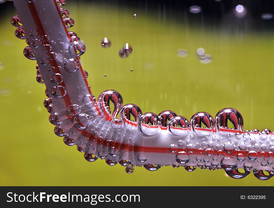 Close up of drink straw with bubbles