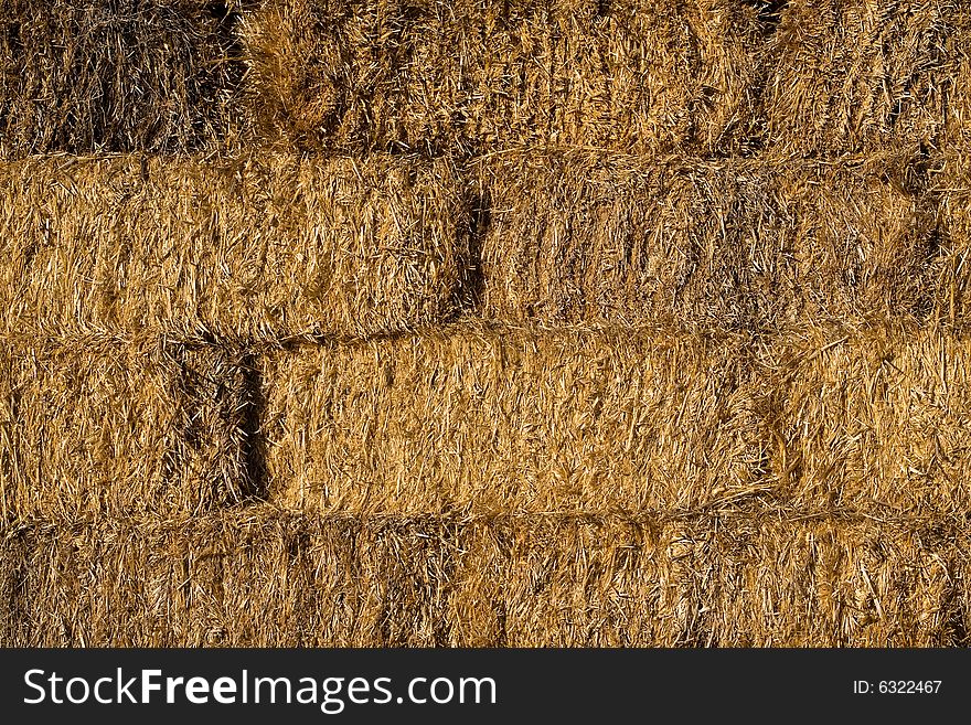 A close-up of straw brick wall pattern