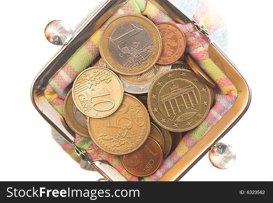 Purse with coins on white