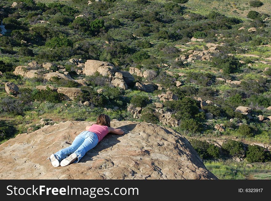 Young Girl Overlooking Canyon