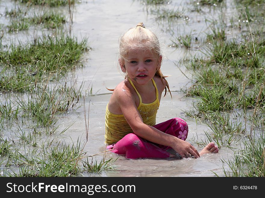 Girl In Muddy Water