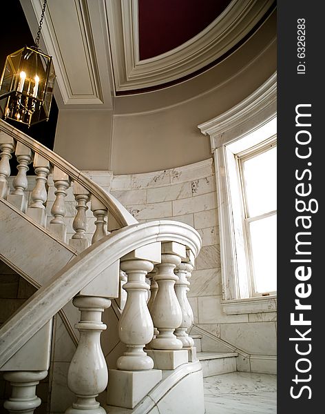 A beautiful stair case in a classic building. A beautiful stair case in a classic building.