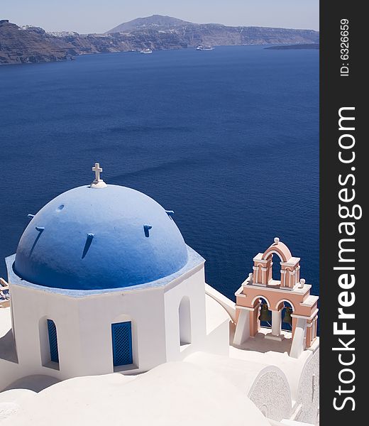 Classic greek view - blue and white church