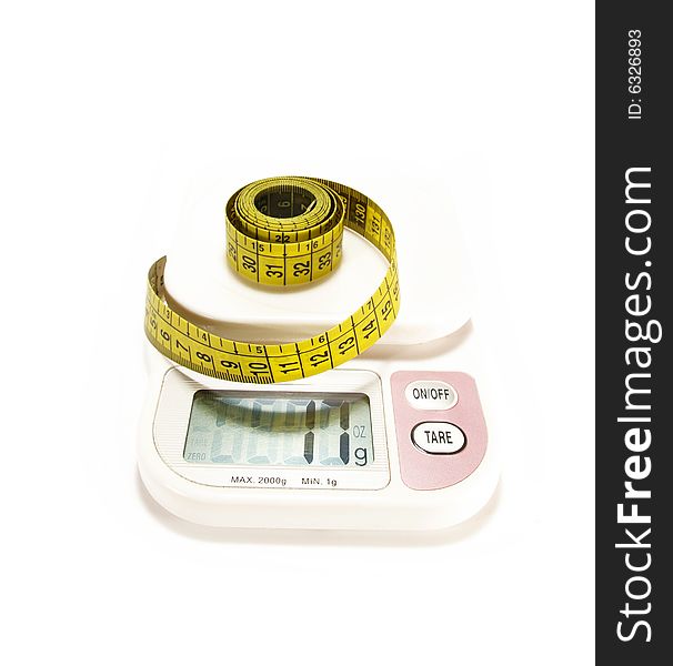 Whirled yellow tape measure isolated on white. Whirled yellow tape measure isolated on white