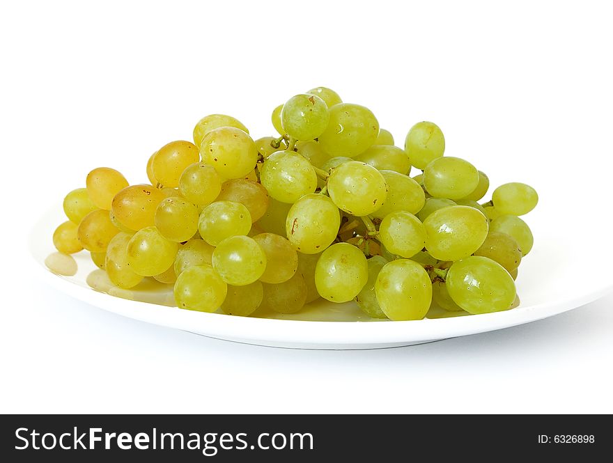 Ripe grapes isolated on a white background. Ripe grapes isolated on a white background
