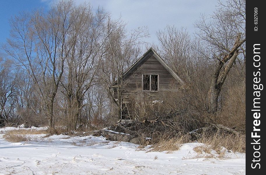 Deserted farm house in winter in southwest Minnesota.