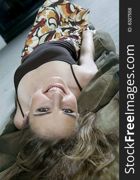 YOung Blonde Woman Lying On The Floor