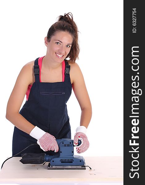 Woman carpenter at work on white background