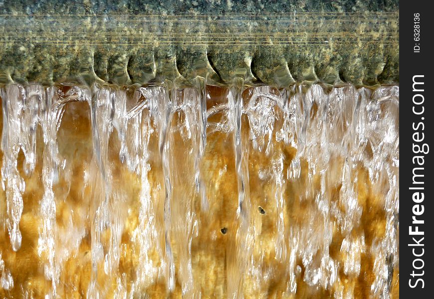 A abstract photograph of some falling water. A abstract photograph of some falling water.