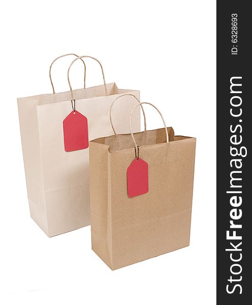 Two Shopping Bags With Red Tag