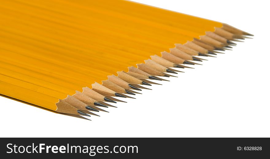 Identical Row of Yellow Pencils