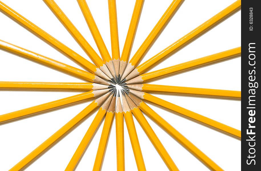 Vibrant Ring of Yellow Pencils arranged in a circle pattern like the spokes of a tire