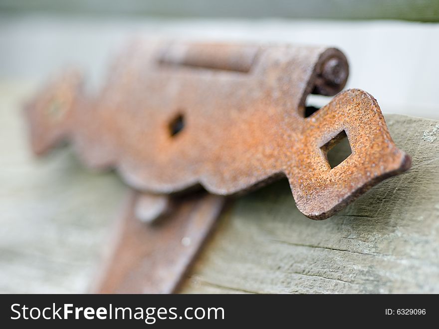 Rusty brown lock of wooden chest. Rusty brown lock of wooden chest