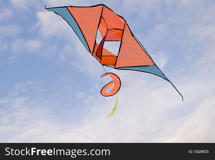 Kite in the blue sky (summer background)